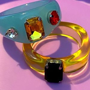 Blue and yellow acrylic rings with rhinestones